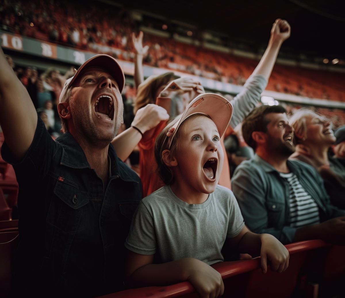 A family enjoying a game in a crowded stadium