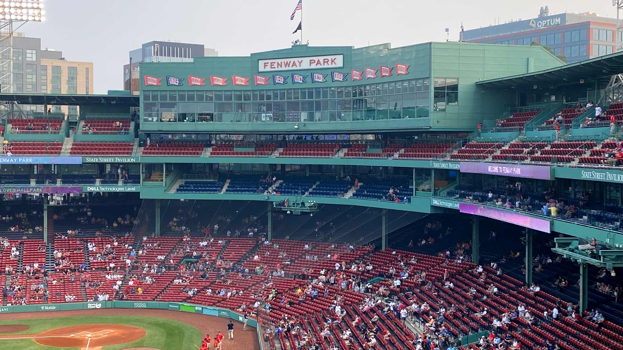 A crowd gathering at Fenway Park for a Red Sox game