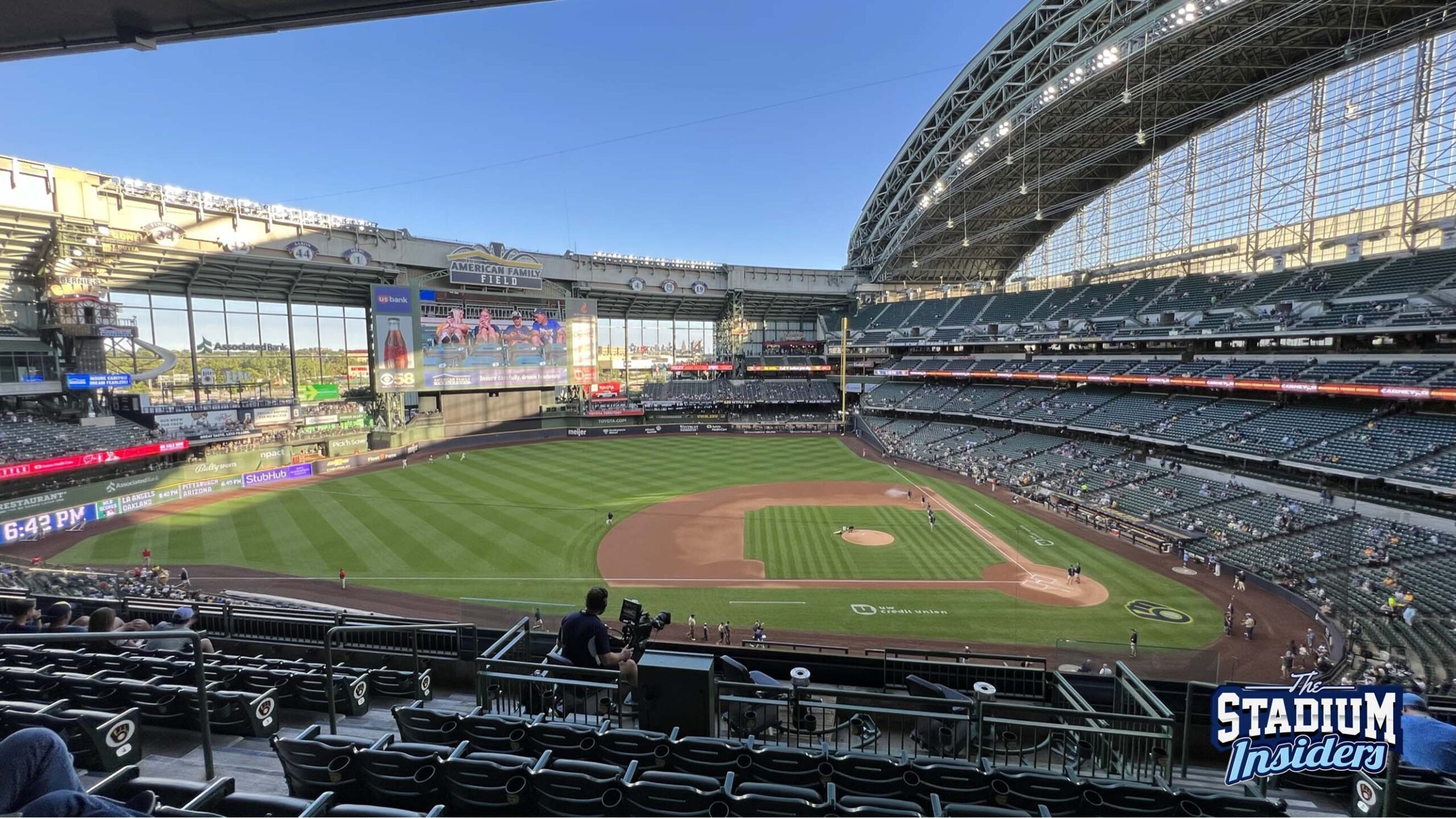 View of American Family Field with an open roof from the 3rd base side of the 300 level