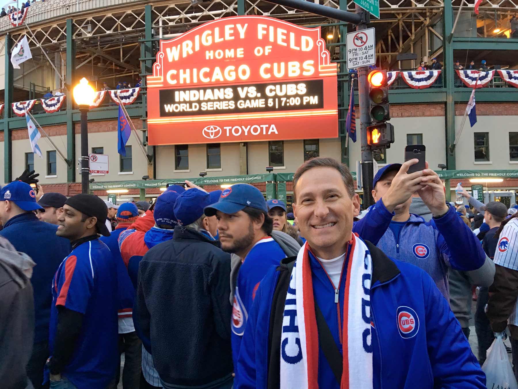 A photo of our Wrigley Field insider, Mike Regent outside of Wrigley Field after a game