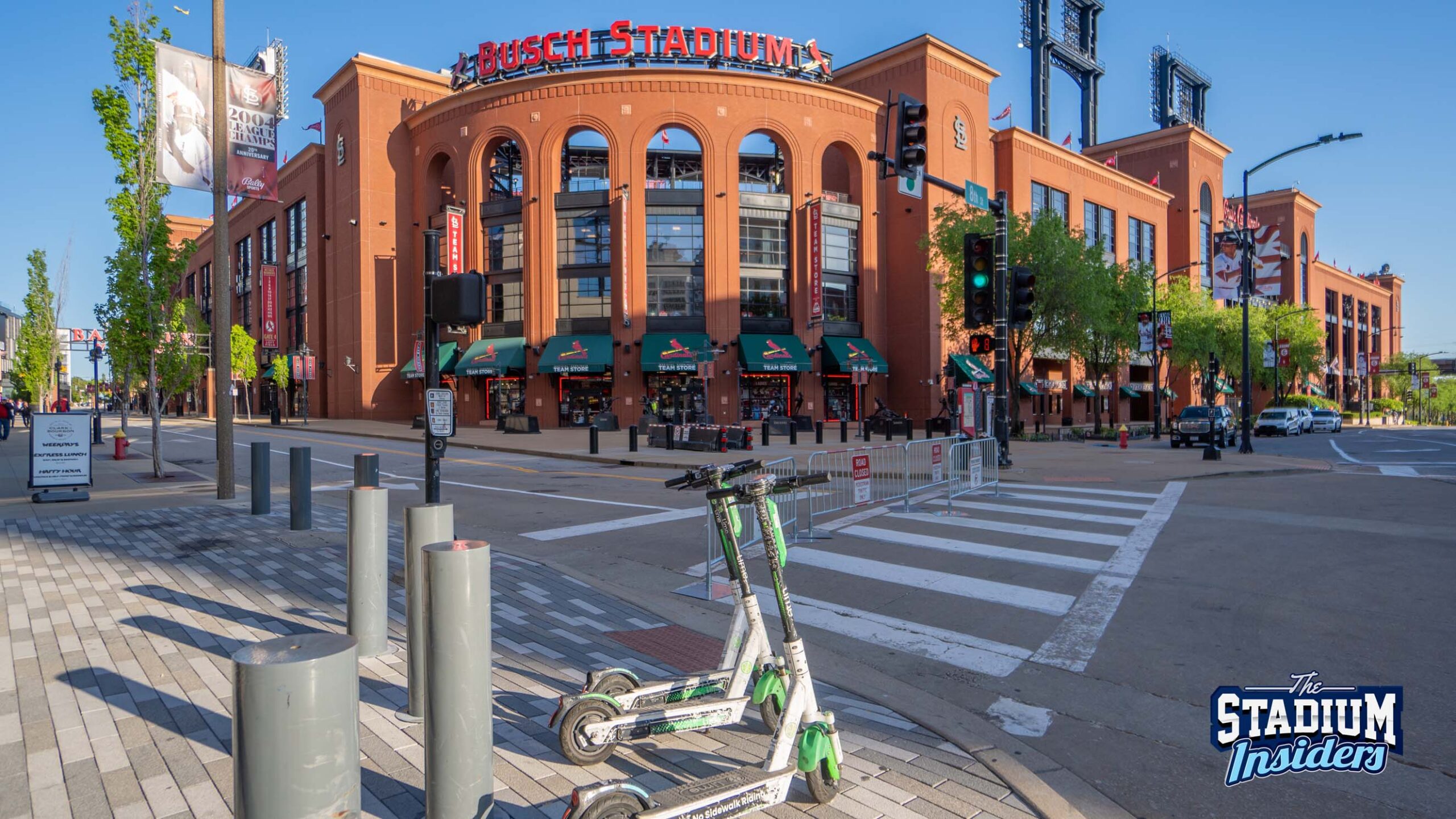 Lime scooters sit across the street from Busch Stadium