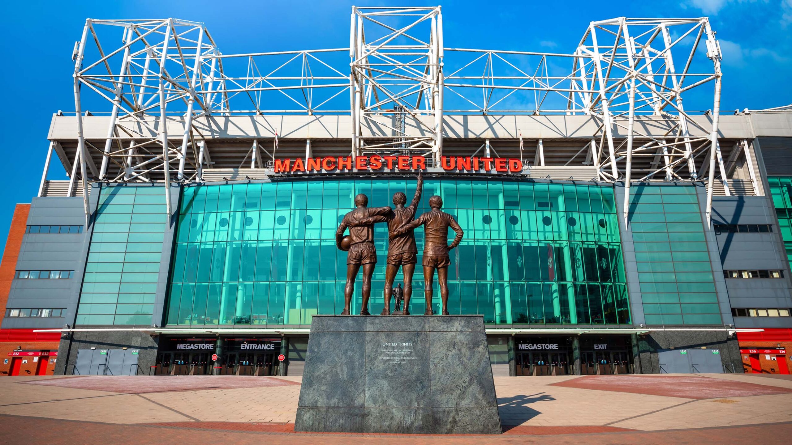 The United Trinity Bronze Sculpture in front of Old Trafford, Manchester